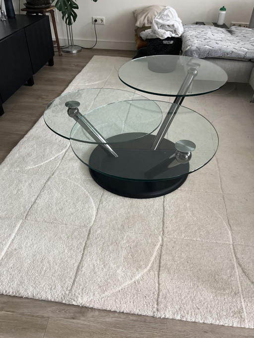 Rotating glass coffee table 