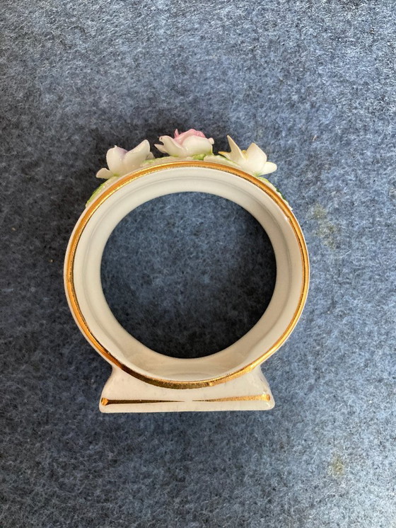 Image 1 of Porcelain napkin ring with applied flowers