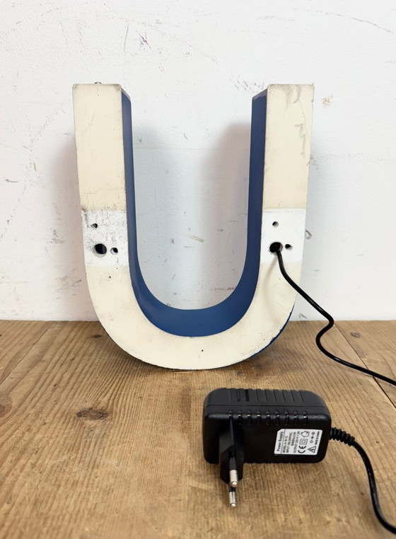 Image 1 of Industrial dark blue enamel factory pendant light made in United Kingdom during the 1950s. White enamel inside the shade. Brass 