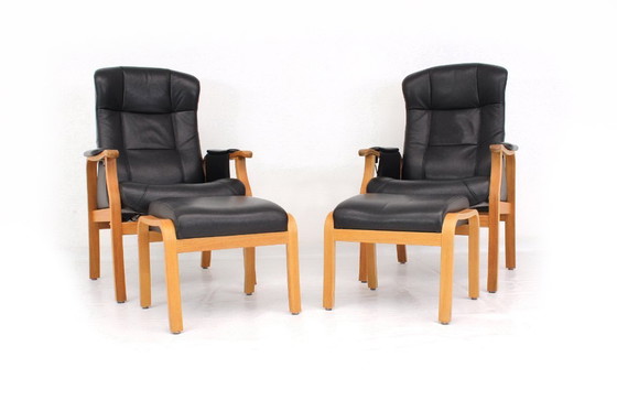 Image 1 of as new, Danish Nordic Easy Lounge Chair / Relax Armchair with stool in oak and leather.