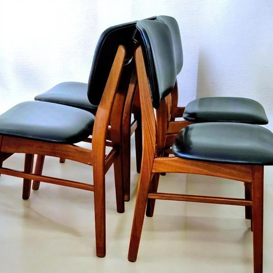Image 1 of 4 x vintage teakhouten eetkamerstoelen met echt leren (zwarte) bekleding
