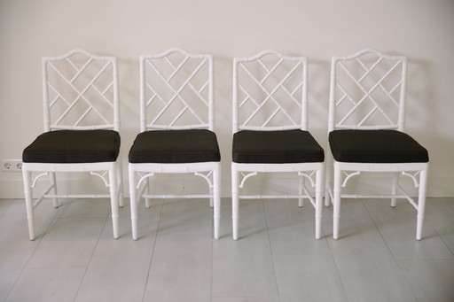 Dining room table and 4 chairs Jonathan Adler style. In 2024 the seats of the chairs are upholstered in black fabric.