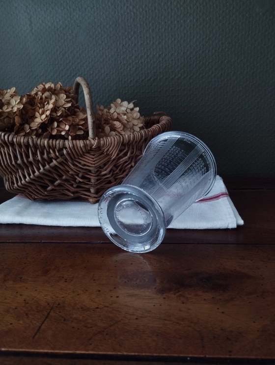 Image 1 of Mougin maatbeker van dik geperst glas