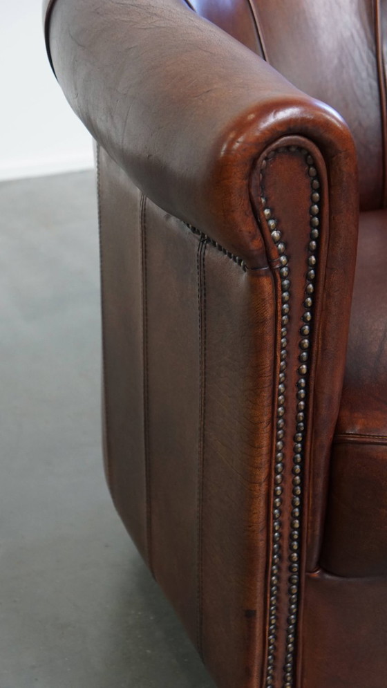 Image 1 of Sheep Leather Club Chair in a Dark Cognac Color