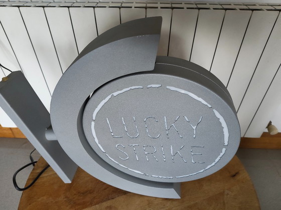 Image 1 of Vintage draaiend lichtreclamebord Lucky Strike