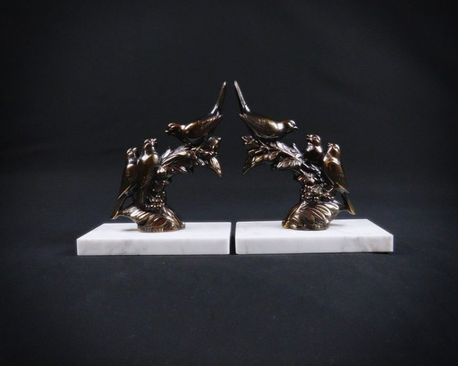 Pair of regule and marble bird sculpture bookends signed Frécourt art deco