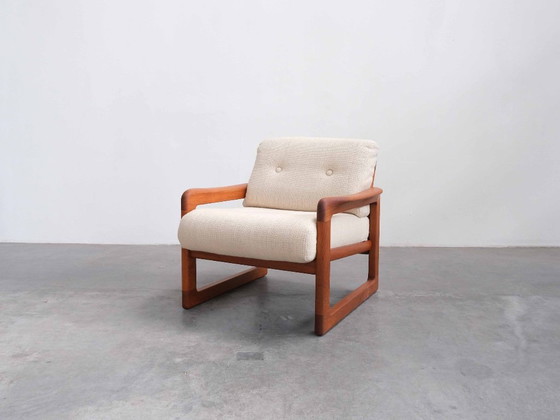 Image 1 of Set van 2 vintage loungestoelen/fauteuils van teakhout uit het midden van de 20e eeuw.