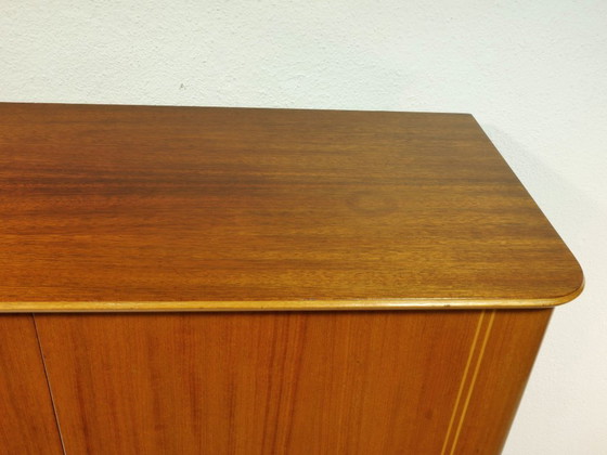 Image 1 of Vintage hallway cabinet / multi-purpose cabinet / linen cupboard – Mid-century walnut cabinet, 1960s, Germany