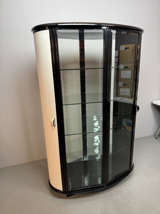 Image 1 of Rare Mid-Century Italian Design Glass Display Cabinet with White Leather Doors in Black Wooden Frame by Rossi di Albizatte. 