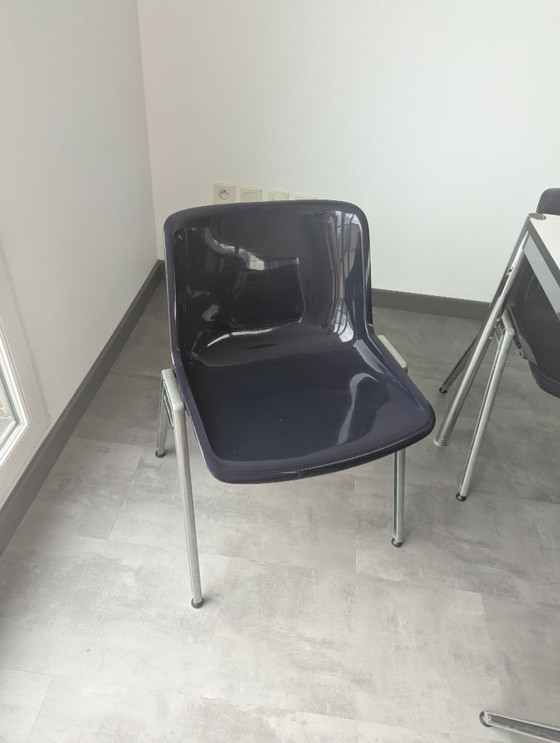 Image 1 of 8 chairs and a table from the brand Tecno - Vintage design