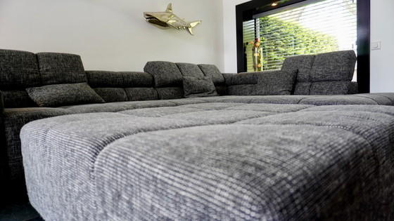 Image 1 of Moderne Grijze Hoekbank met Hocker - Comfortabel en Stijlvol