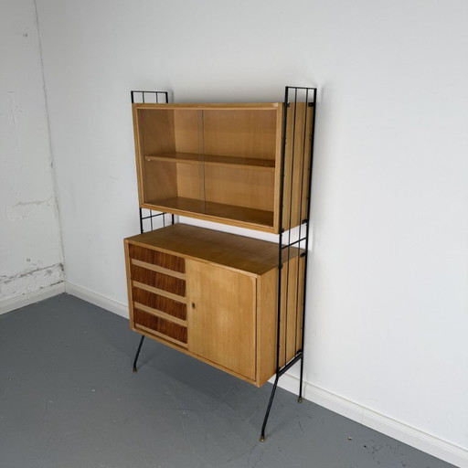 Elegant Mid - Century shelf with display cabinet and chest of drawers in string look