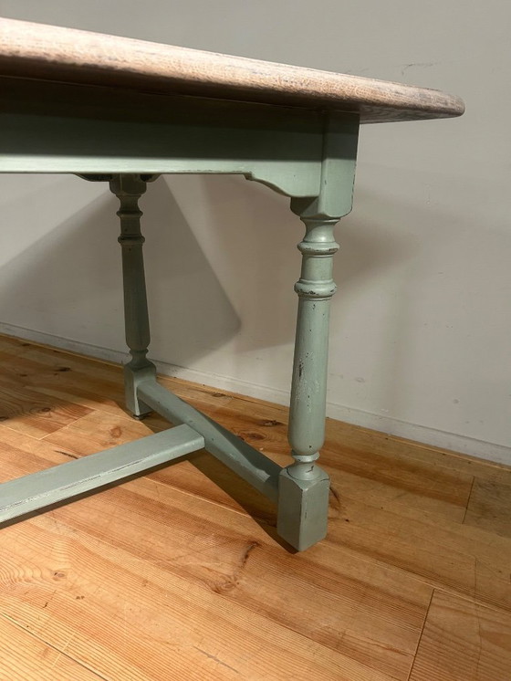 Image 1 of Landelijke vintage boerentafel met groen onderstel in eik