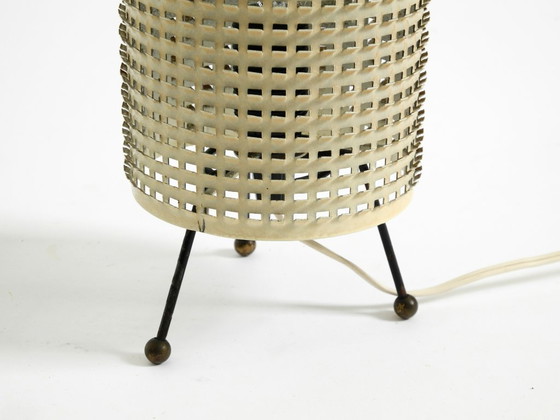 Image 1 of Original 1950s brass tripod table lamp with a perforated metal lampshade