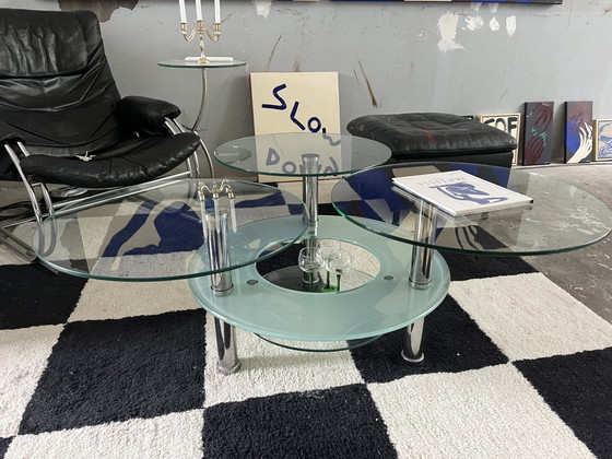 Image 1 of Coffee table with rotating leaves
