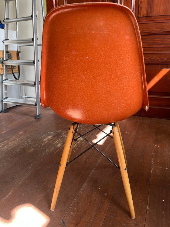 Image 1 of Orange Vitra Eames side chair DSW by Herman Miller (labeled)