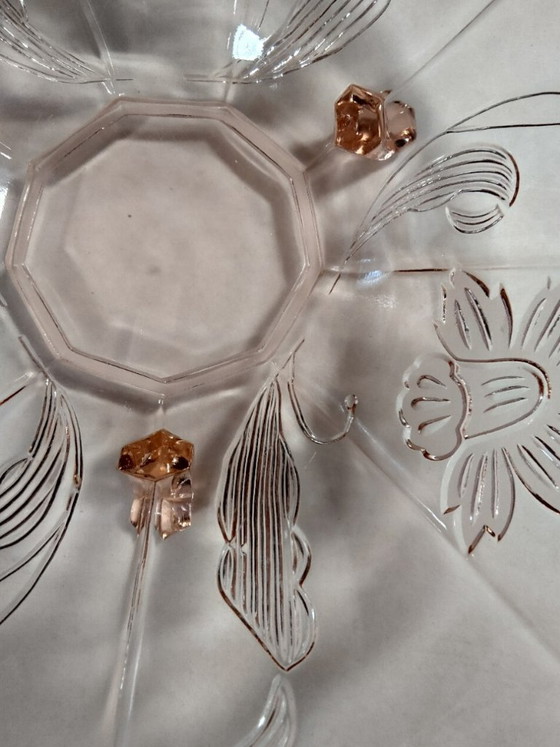 Image 1 of ciotola in vetro rosa con motivo floreale