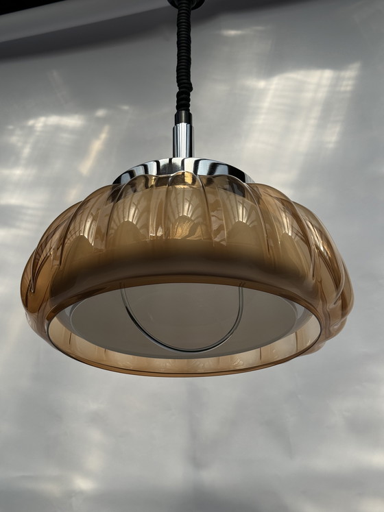 Image 1 of Vintage oranje Dijkstra bloem hanglamp uit de jaren 70 met een futuristisch design.