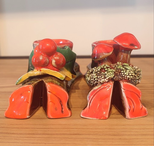 Antique slip ceramic candlesticks