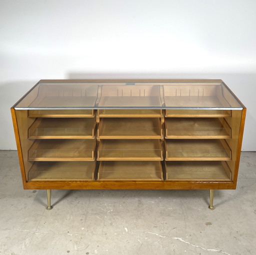 Vintage counter with drawers and glass top