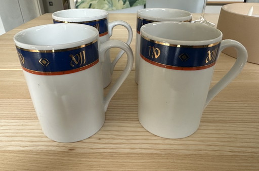 4 cups Sabira Manek for DSM Elastomers.