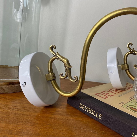 Image 1 of Large pair of brass gooseneck wall lights, clear glass globes, white metal rosettes