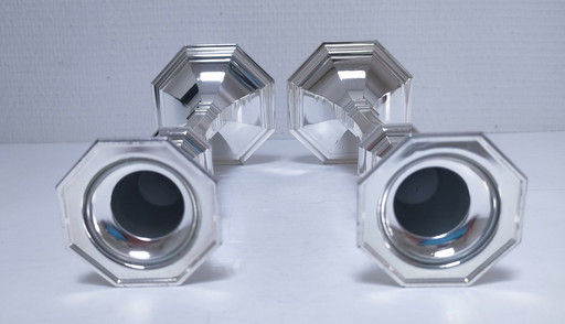 pair of silver-plated stamped bmf candlesticks