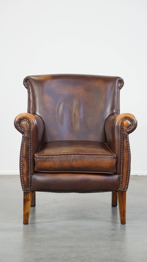 Fauteuil/chaise en cuir de boeuf marron foncé