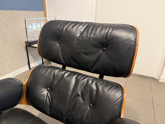 Image 1 of Herman Miller / Contura | Charles & Ray Eames | Lounge Chair & Ottoman | Rosewood & Black Leather | 1x Set