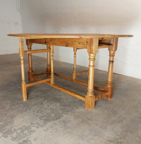 Image 1 of Vintage pine gateleg drop leaf dining table 