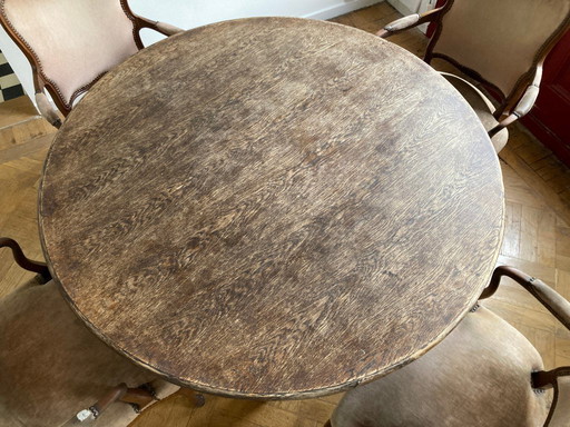 Mesa redonda con 4 sillas retro