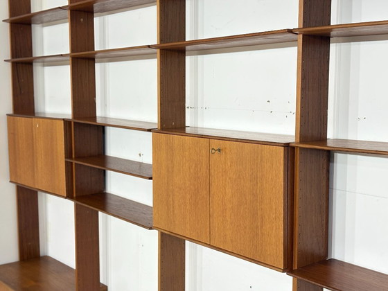 Modular mid-century wall shelf by interna-Peter Pedrides / Teak shelving system 1960s – Shelving unit, Wood (photo 25 of 27)