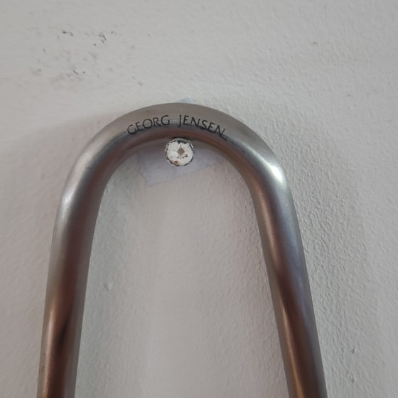 Wandkandelaar genaamd "Swing" van het Deense merk Georg Jensen – Kandelaars en kaarsen, rvs (photo 9 of 10)