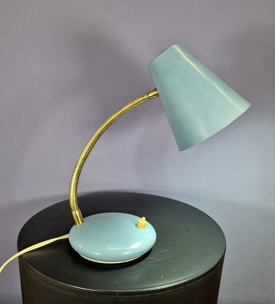 Image 1 of Massive desk lamp in light blue pastel.