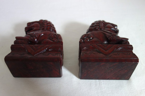 Image 1 of Een paar vintage Chinese houten Foo-honden
