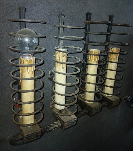 Image 1 of Iron wall sconces, inspired by the medieval cellar rat candlestick style