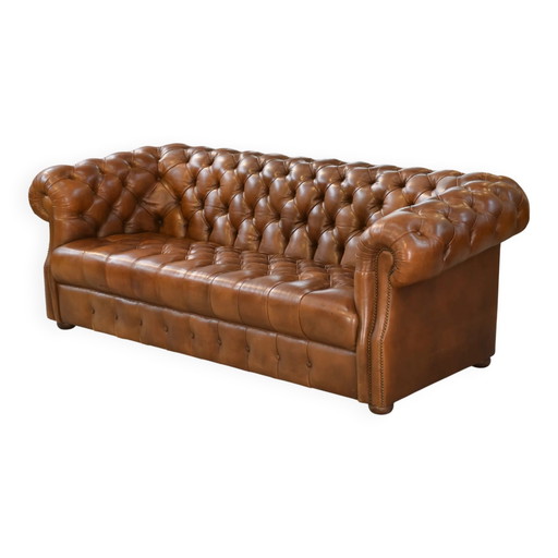 Tan leather tufted Chesterfield sofa