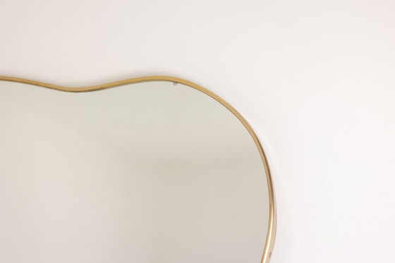 Image 1 of Pair of mirrors, Gio Ponti style. Brass frame. 1980s.