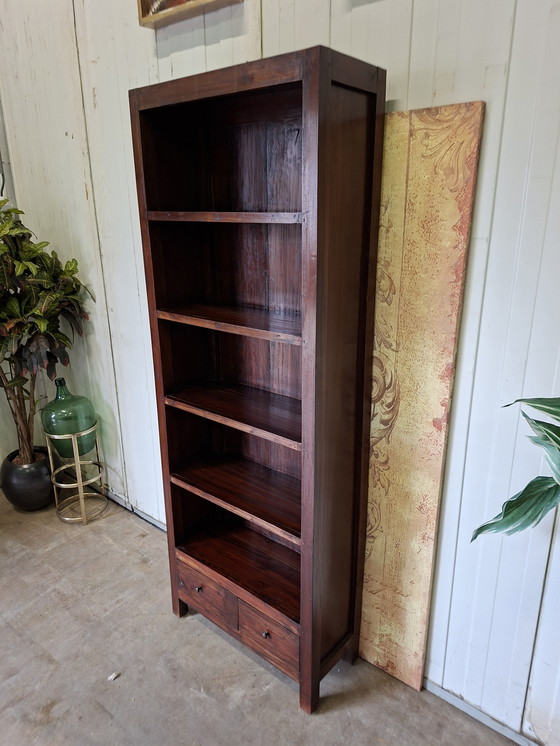 Image 1 of Donker teakhouten boekenkast afm. 96x29cm en 190cm hoog.