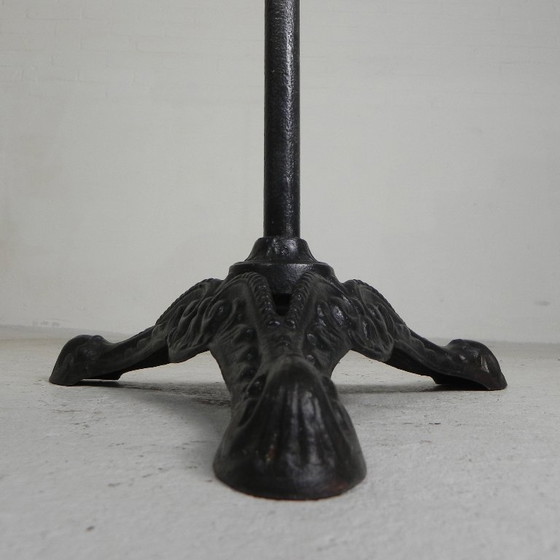 Image 1 of Bistro table with cast iron legs and round steel top, 1930s