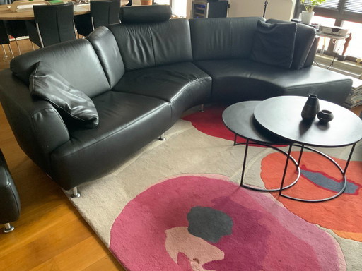 Black leather organic sofa from FM Muster