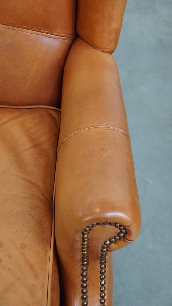 Image 1 of 2x Rundleren oorfauteuil afgewerkt met siernagels