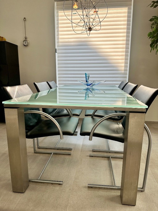 6 chaises circulaires metaform et table en acier inoxydable avec plateau en verre