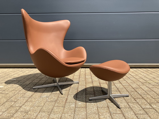 Image 1 of 2x Fritz Hansen Egg Chair + Ottoman en cuir Cognac NEUF !!!