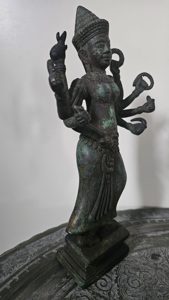 Image 1 of Heavy bronze Asian statue with multiple arms – sculptural statement