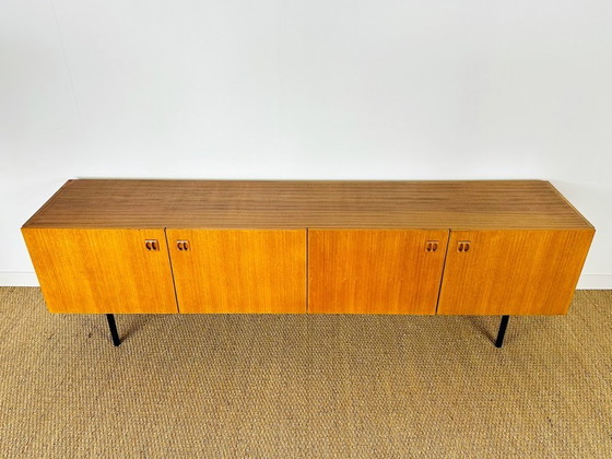 Image 1 of Minimalist Scandinavian sideboard in teak with black metal legs, 1960