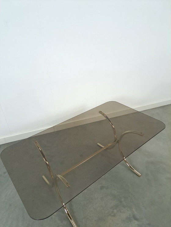 Image 1 of Tavolino in vetro fumé con gambe dorate dalla Svezia
