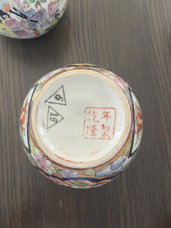 Image 1 of Set of 2 Japanese hand-painted Kutani ginger jars with lids and wooden feet