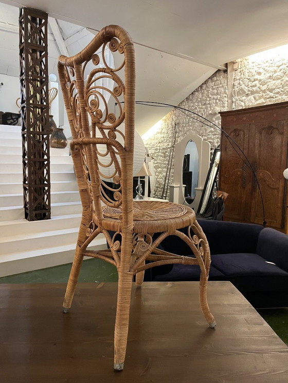 Image 1 of Een paar pauwenrotan stoelen