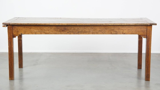 Image 1 of Antique French dining table from the early 19th century with two drawers and a breadboard / extendable top